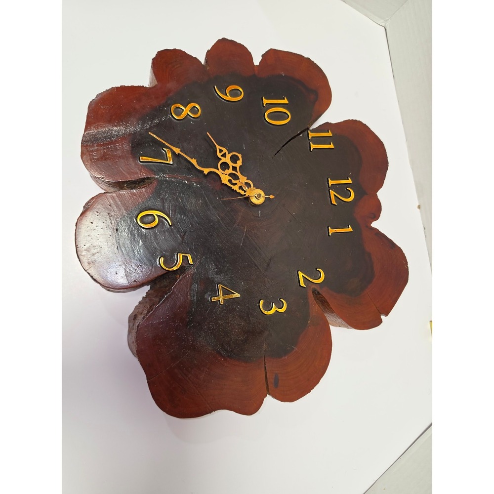 vintage live-edge wall clock is crafted from a natural wood tree slice,